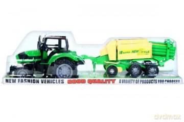 Traktor z akcesoriami pod kloszem