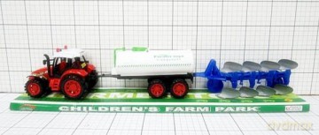 Traktor z maszynami pod kloszem