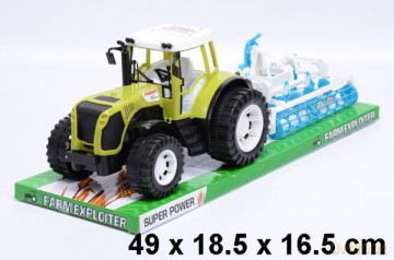 Traktor z maszynami pod kloszem