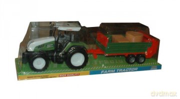 Traktor z maszynami pod kloszem.