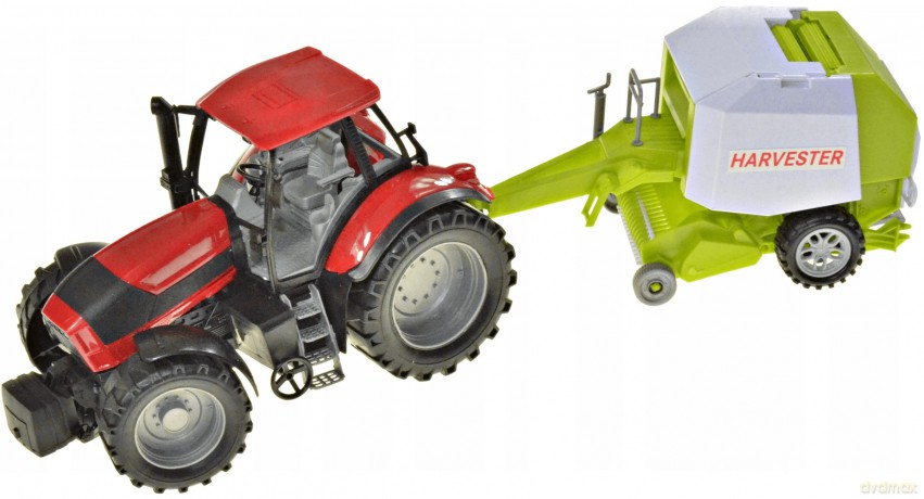 Traktor z maszyną rolniczą pod kloszem
