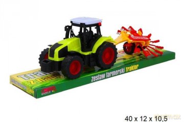 Traktor z maszyną rolniczą pod kloszem