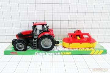 Traktor z maszyną rolniczą pod kloszem