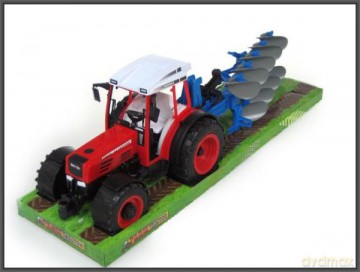 Traktor z pługiem pod kloszem