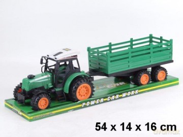 Traktor z przyczepą pod kloszem