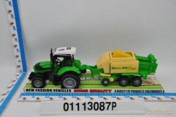 Traktor z przyczepą pod kloszem
