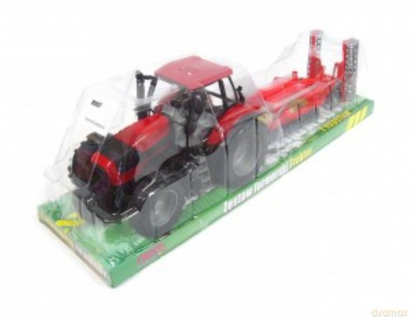 Traktor z przyczepą pod kloszem
