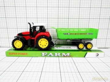 Traktor z przyczepą pod kloszem