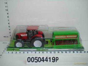 Traktor z przyczepą pod kloszem