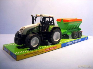 Traktor z rozsiewnikiem pod kloszem