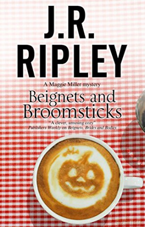 Beignets and Broomsticks: A Cozy Café Mystery Set in Smalltown Arizona: 3 (A Maggie Miller Mystery) - J.R. Ripley [KSIĄŻKA]