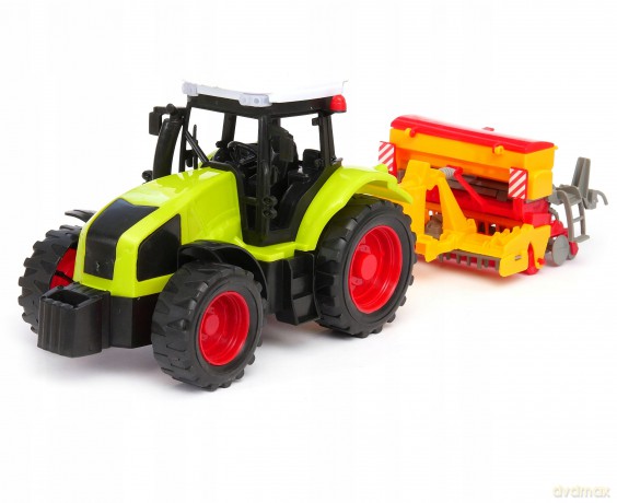 Traktor z przyczepą pod kloszem