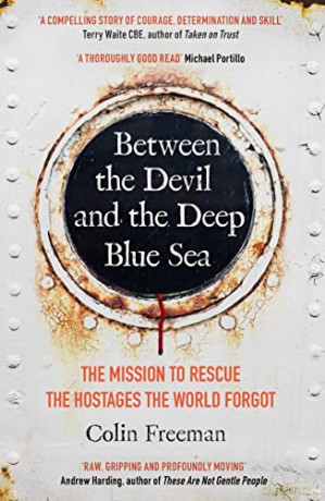 Between the Devil and the Deep Blue Sea: The mission to rescue the hostages the world forgot - Colin Freeman [KSIĄŻKA]