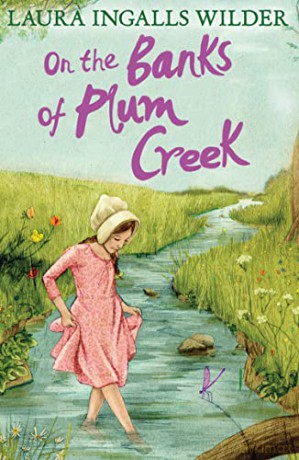 On the Banks of Plum Creek (The Little House on the Prairie) - Laura Ingalls Wilder [KSIĄŻKA]