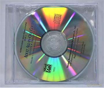 Alfred 00-14532 Basic Adult All-in-One Piano Course CD for Level 2 - Music Book [KSIĄŻKA]