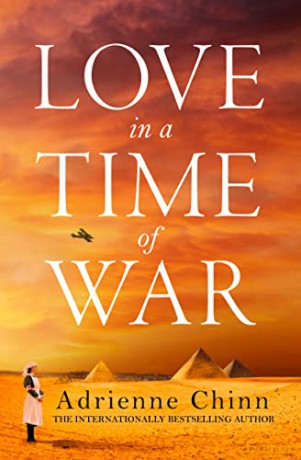 Love in a Time of War: The best new sweeping, escapist historical fiction book release of 2022!: Book 1 (The Three Fry Sisters) - Adrienne Chinn [KSIĄŻKA]