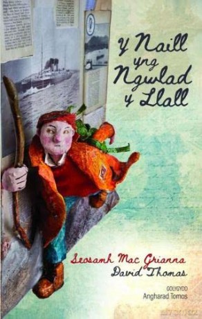 Naill yng Ngwlad y Llall, Y - Taith Gwyddel yng Nghymru; Taith Cymry yn Iwerddon - Angharad Tomos [KSIĄŻKA]