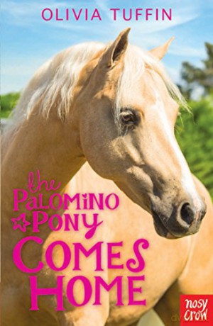 The Palomino Pony Comes Home - Olivia Tuffin [KSIĄŻKA]