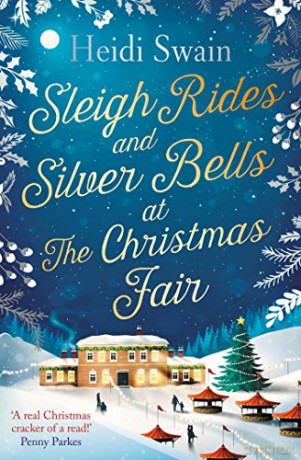 Sleigh Rides and Silver Bells at the Christmas Fair: The Christmas favourite and Sunday Times bestseller - Heidi Swain [KSIĄŻKA]