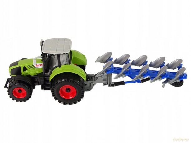 Traktor z pługiem na napęd frykcyjny zielony