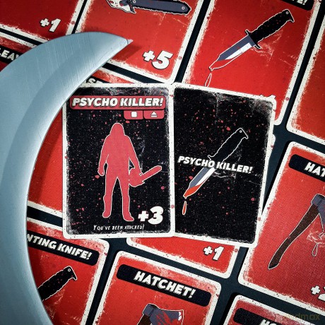 Psycho Killer: The Card Game - a fast-paced, strategic and hilarious game based on your favourite retro horror and slasher films, for ages 15 to Adult [KSIĄŻKA]