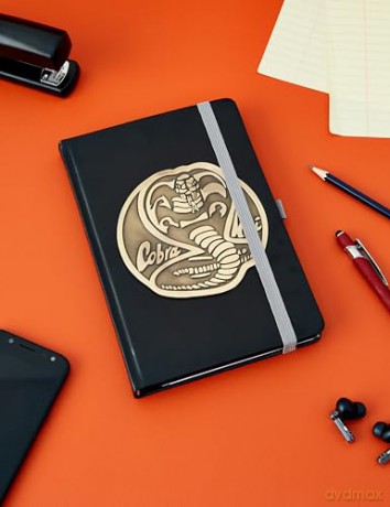 Pyramid International Cobra Kai A5 Faux Leather Notebook with Metal Badge Design - Official Merchandise [KSIĄŻKA]