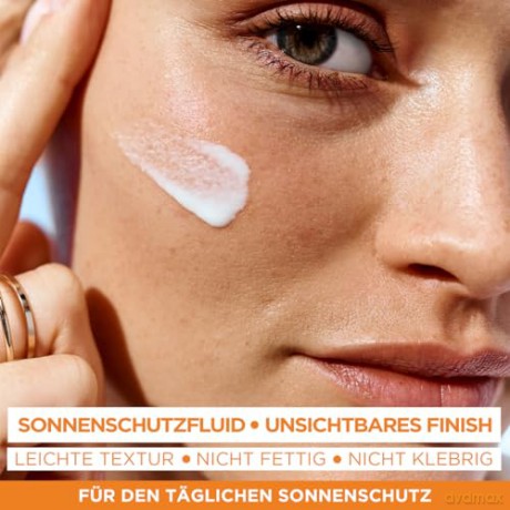 Garnier UV-Sonnenschutzfluid gegen dunkle Flecken, Sehr hoher Sonnenschutz mit LSF 50+, Unsichtbares Finish, Ambre Solaire Super UV Vitamin C Daily Fluid, 1 x 40 ml