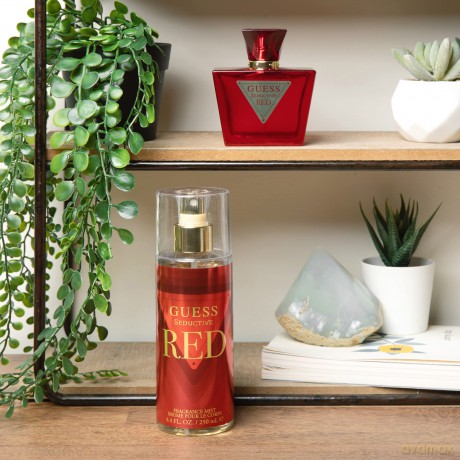 Guess Guess Seductive Red For Women 4 PC Gift Set 2.5oz EDT Spray, 3.4oz Body Lotion, 0.5oz Travel EDT Spray, Pouch
