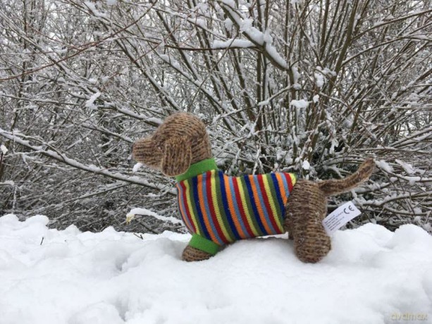 Best Years Knitted Sausage Dog Soft Toy with Multi Striped Jumper. Suitable from Birth