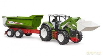 Traktor z ładowaczem czołowym i przyczepą