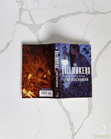 The Dollmakers: A Novel from the Fallen Peaks [KSIĄŻKA]
