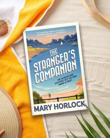 The Stranger's Companion: The perfect escapist read for the summer - Mary Horlock [KSIĄŻKA]