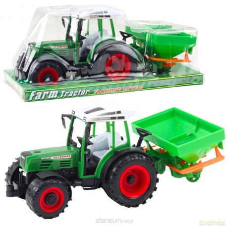 Traktor rolniczy z siewnikiem zielony
