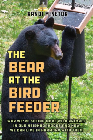 The Bear at the Bird Feeder: Why We're Seeing More Wild Animals in Our Neighborhoods and How We Can Live in Harmony with Them - Randi Minetor [KSIĄŻKA]