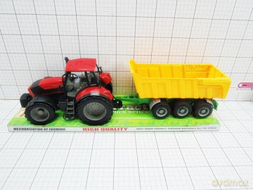 Traktor z przyczepą pod kloszem